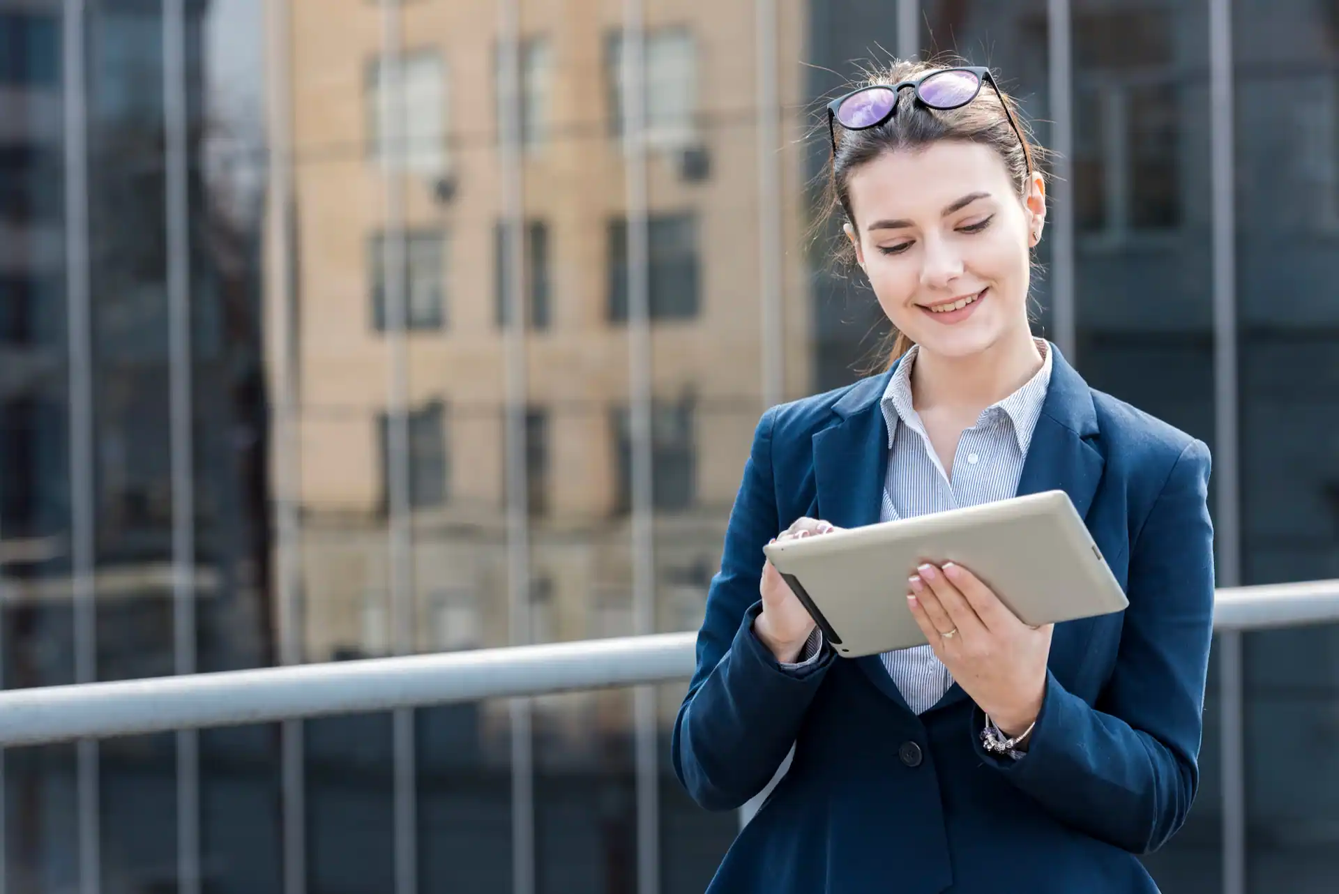 female employee holding a tablet